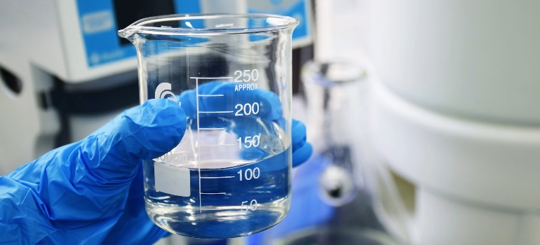 Water in a beaker being tested in a lab.