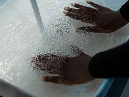 woman checking water