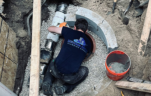 a plumber installing a backflow prevention device