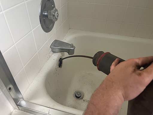 a customer in wicker park having their regular drain cleaning service provided.
