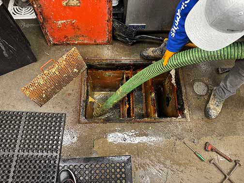 a professional chicago grease trap cleaning.