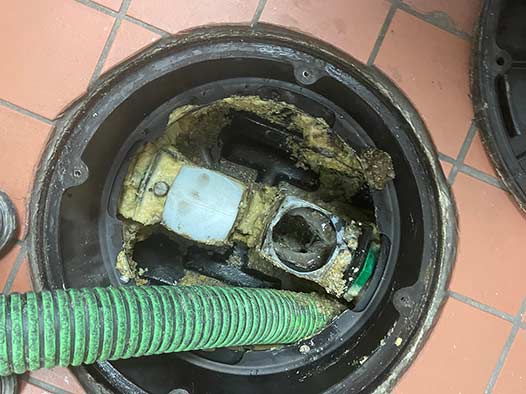 a restaurant grease trap pumping.