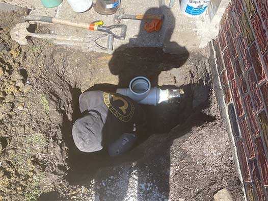 our plumber installing a sewer cleanout in chicago.