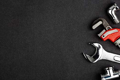 plumbing tools for fixing a jammed garbage disposal.