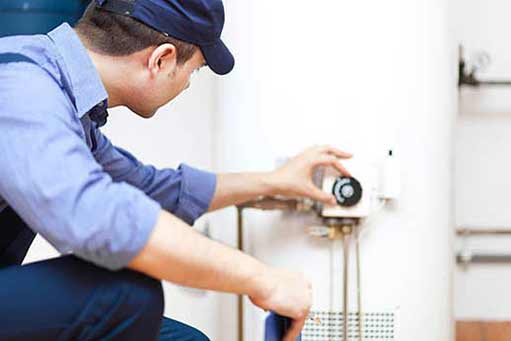 a plumber providing a professional water heater replacement.