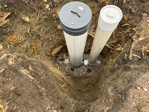 a sewer backflow valve installation.