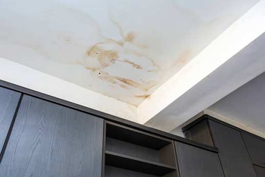 water leaking through a ceiling.