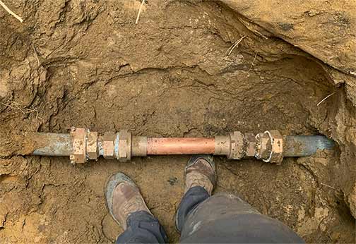 professional water line repair service being performed in chicago