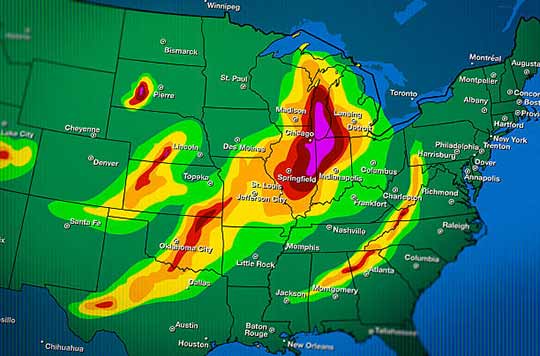 a weather forecast showing heavy rainfall in midwest.